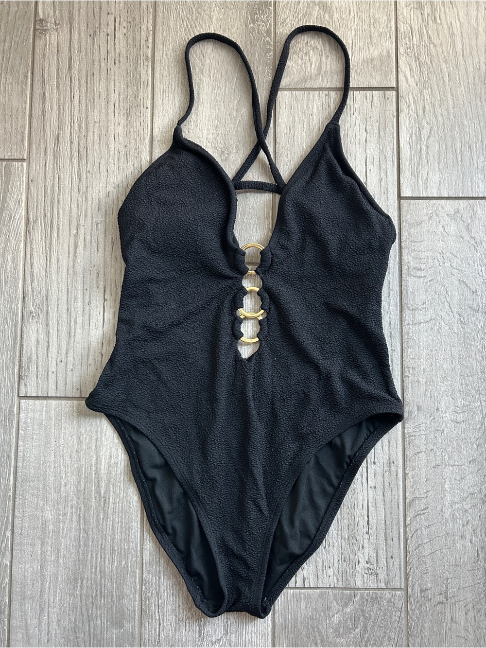 Black One-Piece Swimsuit with Decorative Rings